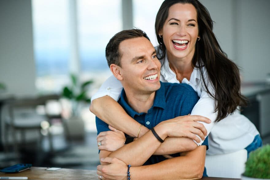 Brendon Burchard smiling with his wife